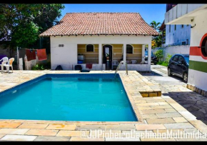 CASA 7 qts sendo 4 suites, Piscina Churrasqueira 200 m praia Anjos